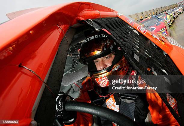 Tony Stewart, driver of the The Home Depot Chevrolet, sits in his car, during practice for the NASCAR Nextel Cup Series Samsung 500 at Texas Motor...