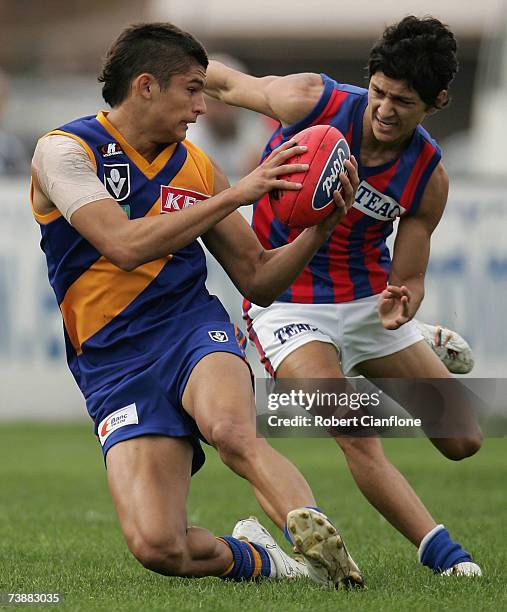 Sharrod Wellingham of Williamstown is challenged by Robin Nahas of Port Melbourne during the round two VFL match between Williamstown and Port...