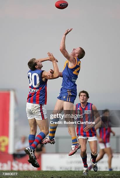 David Fanning of Port Melbourne challenges Scott Meyer of Williamstown of Williamstown during the round two VFL match between Williamstown and Port...