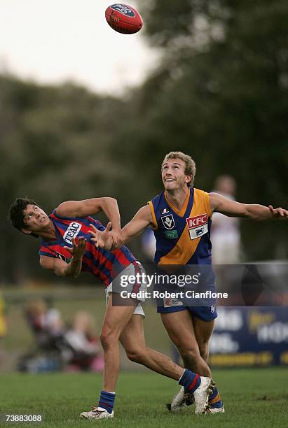 Robin Nahas of Port Melbourne challenges Sam Iles of Williamstown during the round two VFL match between Williamstown and Port Melbourne at Burbank...