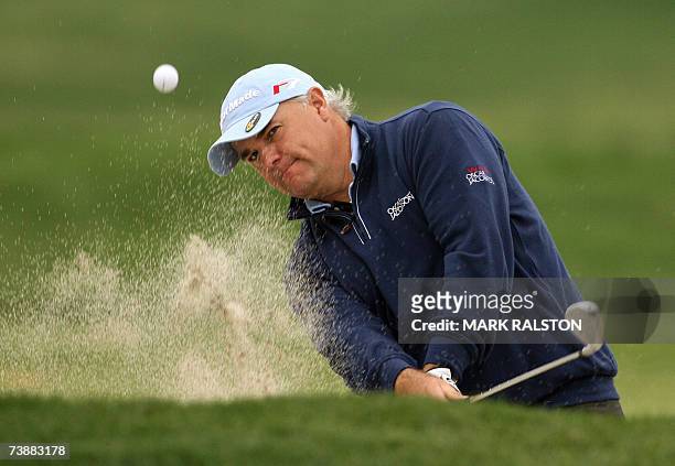 Stephen Dodd of Wales plays out of a bunker on the 18th hole at the Silport Golf Club in Shanghai on day three of the Volvo China Open, 14 April...