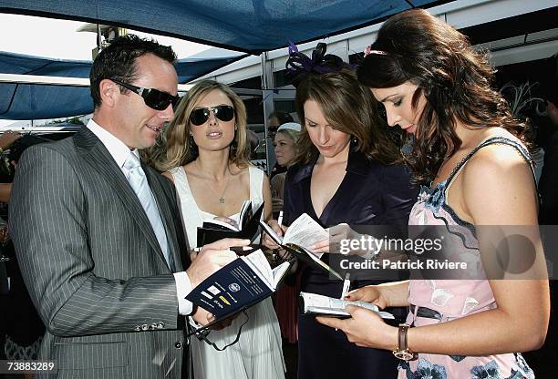 Newsreaders Mike Willesee, Allison Langdon, TV personality Kellie Connolly and former swimmer Giaan Rooney attend the David Jones marquee during the...