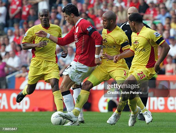 Cristiano Ronaldo of Manchester United clashes with James Chambers of Watford during the FA Cup sponsored by E.ON Semi-final match between Watford...