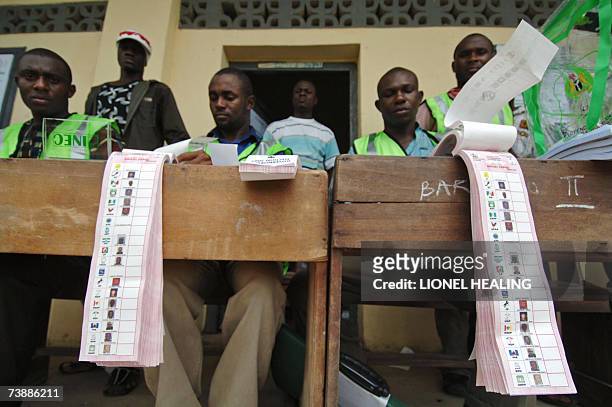 Electoral Commission officials sort through ballot papers at a polling station, 14 April 2007, in Bodo, Ogoni Territory. There have been widespread...