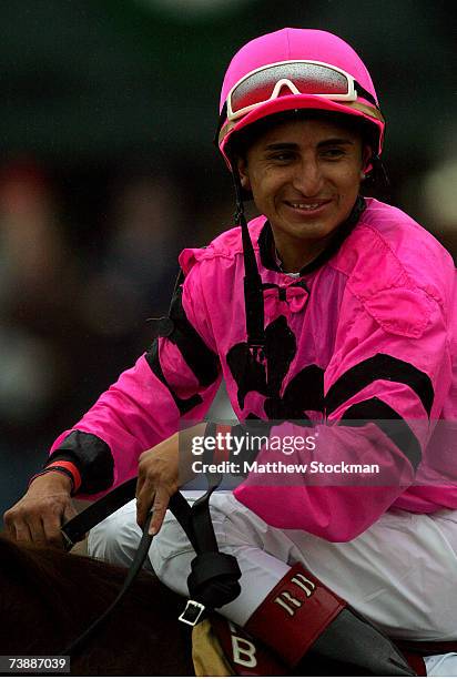 Rafael Bejarno, riding Dominican, celebrates as he is lead to the winner's circle after winning the The Toyota Blue Grass Stakes April 14, 2007 at...