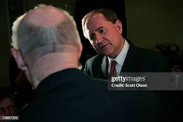 Former Virginia Governor Jim Gilmore greets voters gathered for the Republican Party of Iowa?s Abraham Lincoln Unity Dinner April 14, 2007 in Des...