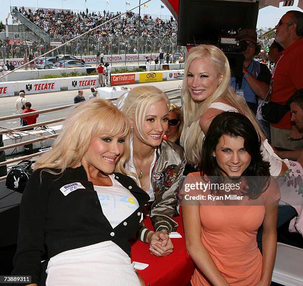 Playmates Cristal Camden, Bridget Marquardt, Lana Kinnear and Dana Workman pose in there box seats during the 31st Annual Toyota Pro/Celebrity Race...