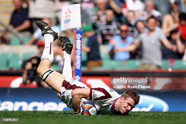 Tom Croft of Leicester crosses the line to score a try during the EDF Energy Cup Final match between Leicester Tigers and Ospreys at Twickenham on...