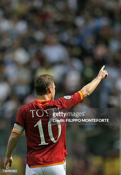 Roma's forward Francesco Totti acknoledges the supporters after scoring his first goal against Sampdoria during their Italian serie A football match...