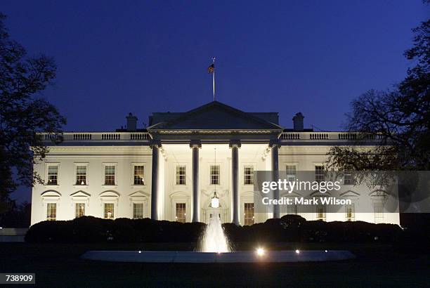 Lights shine on the White House early in the evening November 20, 2001 in Washington, DC. U.S. President George W. Bush announced that the White...