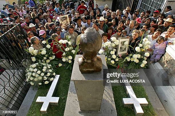 Fans of Mexican actor and singer Pedro Infante, sing in front of his tomb during the commemoration of the 50th anniversary of his death, at the...