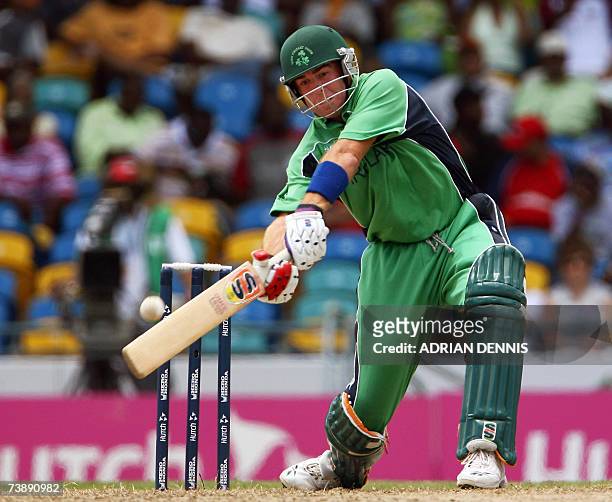 Ireland's Captain Trent Johnston plays a shot against Bangladesh during the Super-Eight ICC World Cup cricket match at the Kensington Oval in...