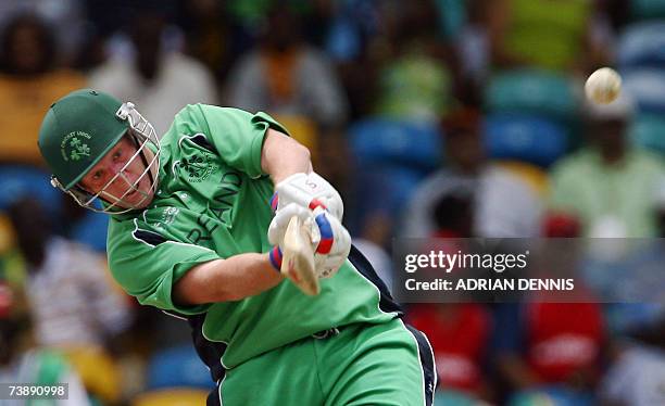 Ireland's Kevin O'Brien hits the ball for 6 runs against Bangladesh during the Super-Eight ICC World Cup cricket match at the Kensington Oval in...