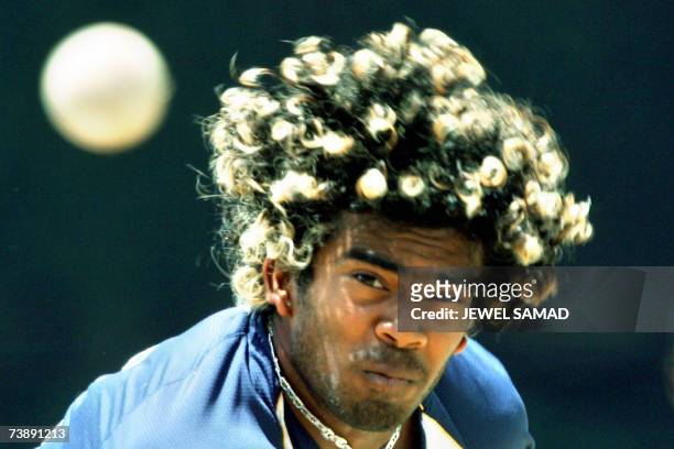 Saint George's, GRENADA: Sri Lankan cricketer Lasith Malinga delivers a ball during a practice session at the Grenada National Stadium in Saint...