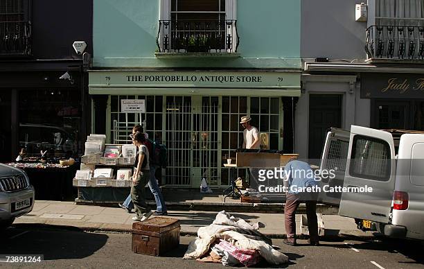 Market stall is set up on Portobello Road in Notting Hill in London on April 15, 2007 in London.