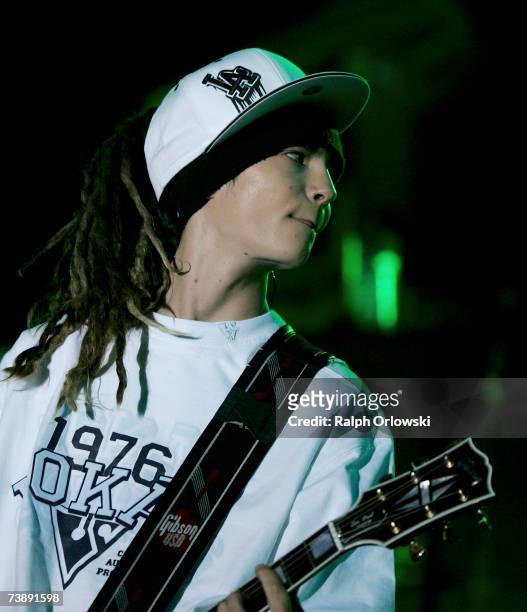 Guitarist Tom Kaulitz of German pop group "Tokio Hotel" performs on stage during a concert at the Festhalle on April 15, 2007 in Frankfurt, Germany.