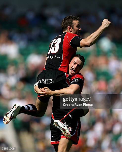 Duncan Roke and Lewis Vinnicombe of Cornish Pirates celebrate after winning the EDF Energy National Trophy match between Cornish Pirates and Exeter...