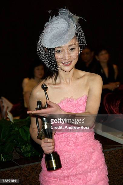 Chinese actress Zhou Xun, who won Best Supporting Actress, arrives at the party for the '26th Hong Kong Film Awards' at the Inter-Continental Hotel...