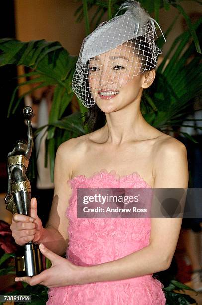 Chinese actress Zhou Xun, who won Best Supporting Actress, arrives at the party for the '26th Hong Kong Film Awards' at the Inter-Continental Hotel...