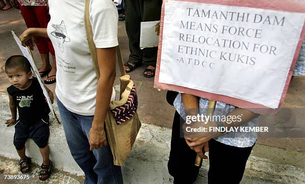 Young member of the Ethnic minority Kuki people holds a placard during a demonstration against the construction of the Thamanti Dam in New Delhi, 16...