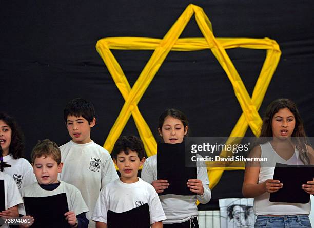 An Israeli school choir takes part in a Holocaust Memorial Day ceremony at the Tali school April 16, 2007 in Hod Hasharon, Israel. The Jewish State...