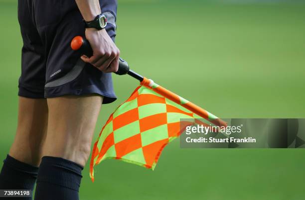Linesman holds his flag during the Bundesliga match between Borussia Dortmund and Werder Bremen at the Signal Iduna Park on April 15, 2007 in...