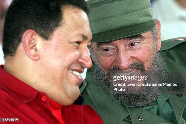 Cuban President Fidel Castro smiles with President of Venezuela Hugo Chavez during the opening ceremony of the 15th annual international Cuban book...