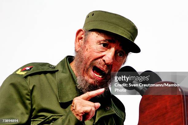 Fidel Castro gives a speech during the traditional 1st of May political rally, at the Plaza de la Revolucion, the Revolution Square, May 1, 2002 in...