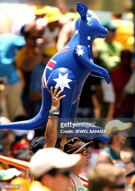 Saint George's, GRENADA: Australian cricket fans toss a toy kangaroo as they watch the ICC World Cup Cricket 2007 Super Eight match between Sri Lanka...