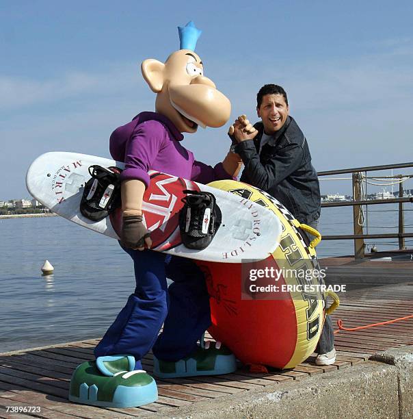 French humorist Smain poses with comic's character Franky Snow, 16 April 2007 in the French southern city of Cannes, during the 44th edition of the...