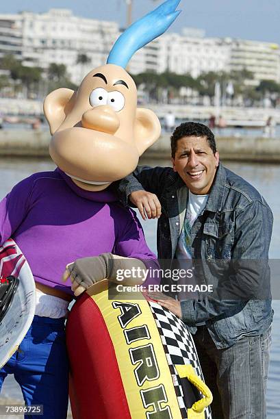 French humorist Smain poses with comic's character Franky Snow, 16 April 2007 in the French southern city of Cannes, during the 44th edition of the...