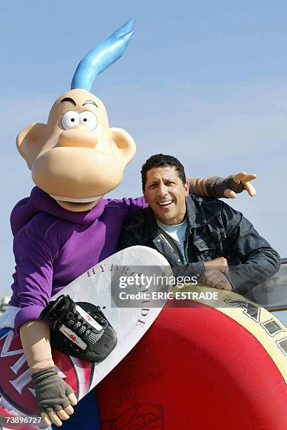 French humorist Smain poses with comic's character Franky Snow, 16 April 2007 in the French southern city of Cannes, during the 44th edition of the...