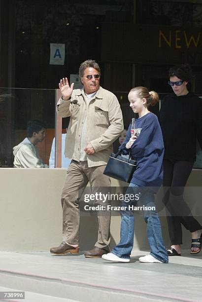 Actor Don Johnson leaves the Newsroom restaurant after having lunch with his pregnant wife Kelley Phleger and his daughter Dakota from his marriage...