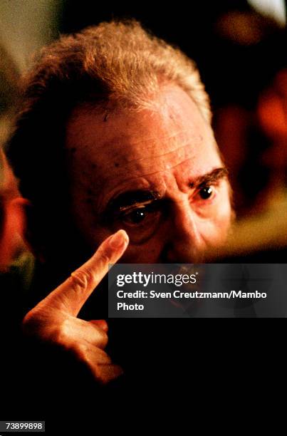 Fidel Castro gestures after a speech given by Hugo Chavez in the Aula Magna of the University of Havana, during an official visit by Chavez after the...