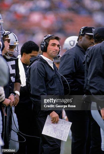 Head coach Mike Shanahan of the Los Angeles Raiders looks on from the sidelines during a game against the Seattle Seahawk in week 16th of the 1988...