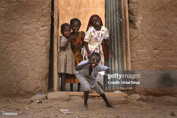 Chadian children play in the streets of Abeche, Chad on April 2007. Tensions between Chad and Sudan have risen over recent weeks, following border...