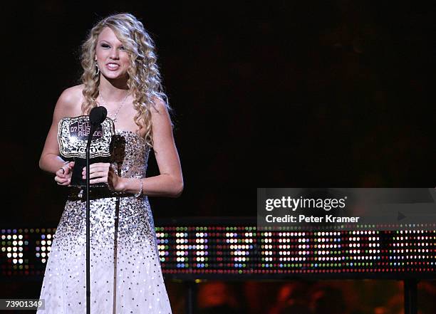 Singer Taylor Swift accepts the award for "Breakthrough Video of the Year" for the song "Tim McGraw" onstage at the 2007 CMT Music Awards at the Curb...