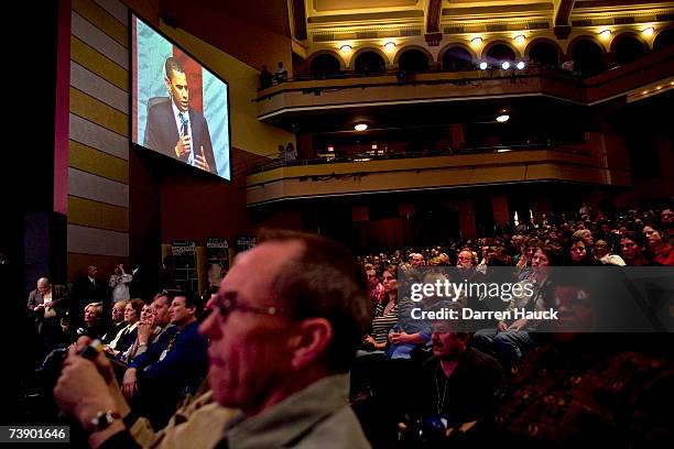 Supporters listen to Democratic presidential candidate U.S. Sen. Barack Obama at the Milwaukee Theater during a fundraiser April 16, 2007 in...