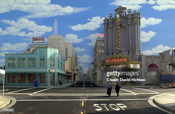 Pedestrians walks through a replica of Hollywood's famous ''Hollywood and Vine'' intersection on a movie ''backlot'' at Disney's California Adventure...