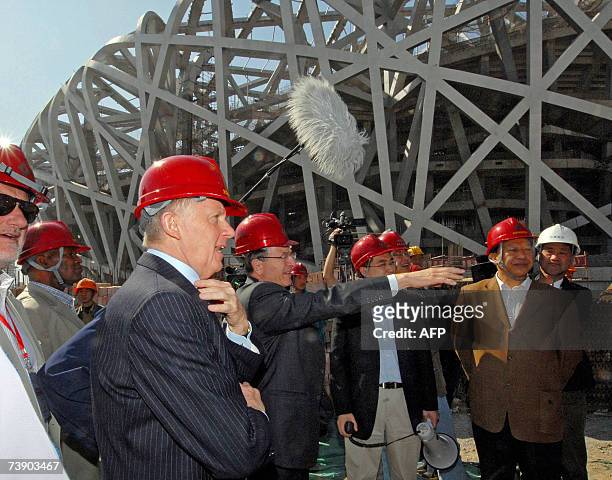 Coordination Commission chairman Hein Verbruggen visits the construction site of the National Stadium, known as the "Bird's Nest", 17 April 2007,...