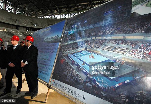 Coordination Commission Chairman, Hein Verbruggen visits the construction site of Beijing National Stadium, nicknamed the "Bird Nest" on April 17,...