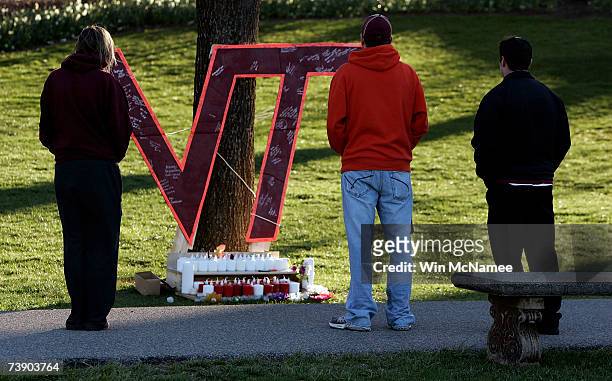 Virginia Tech students gather near a memorial constructed on the Virginia Tech campus for the victims of yesterday's mass killings April 17, 2007 in...
