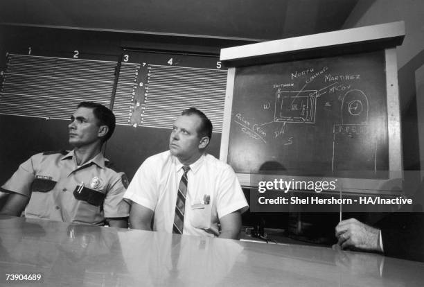 Police officer Ramiro Martinez at a press conference after he and other officers shot student Charles Whitman dead after Whitman went on a shooting...