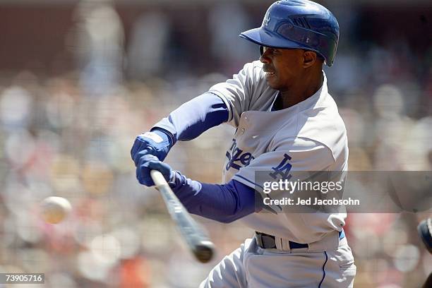 Juan Pierre of the Los Angeles Dodgers swings at the pitch against the San Francisco Giants during a Major League Baseball game on April 8, 2007 at...