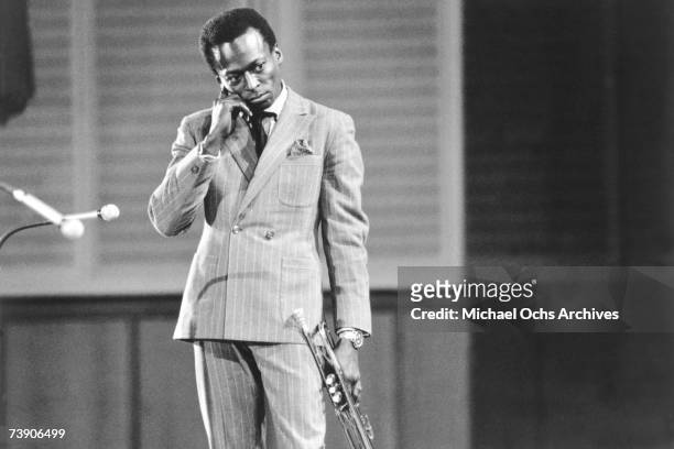 Jazz trumpeter and composer Miles Davis plays trumpet as he performs onstage in circa 1959 in West Germany.