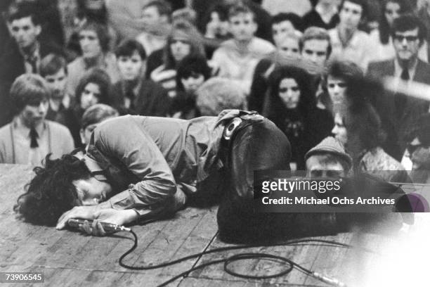 American singer-songwriter Jim Morrison of The Doors unconscious on stage at Het Concertgebouw, Amsterdam after a drug binge, 15th September 1968.