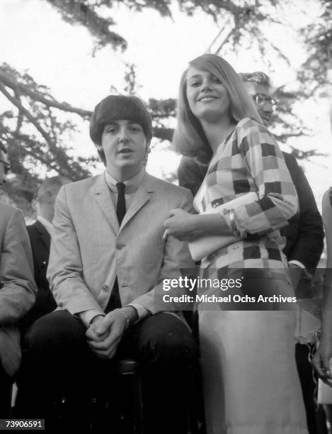 Paul McCartney of the rock and roll band "The Beatles" poses for a portrait with actress Peggy Lipton on August 24, 1964 in Los Angeles, California.