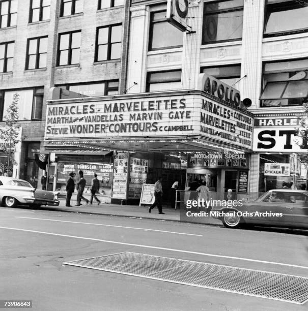 The Apollo Theater in Harlem, New York City, circa 1963. Shows advertised include concerts by The Miracles, The Marvelettes, Martha and the...