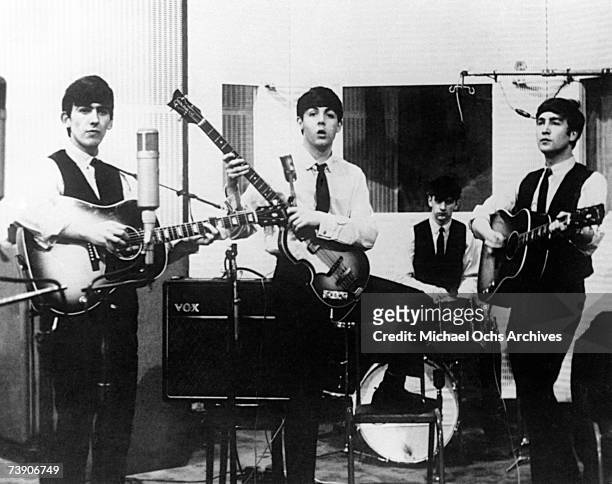 Rock and roll band "The Beatles" pose for a portrait during a recording session at Decca Studios the day they recorded "From Me To You", "Thank You...