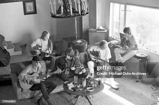 Superstar group "Buffalo Springfield" rehearse inside their house on October 30, 1967 in Malibu, California. Bruce Palmer, Stephen Stills, Neil...